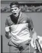  ?? Clive Brunskill Getty Images ?? MILOS RAONIC of Canada gets fired up during his match.