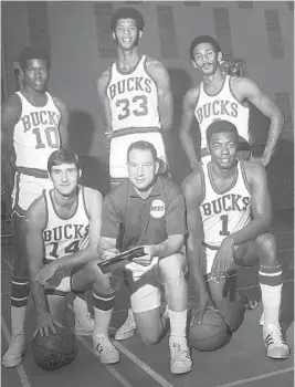  ?? AP ?? Oscar Robertson (1) was traded in 1970 at age 31 from the Cincinnati Royals to the Bucks. He teamed up with Kareem Abdul-Jabbar (33), named Lew Alcindor at the time, to win a title.