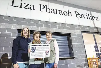  ?? ?? Honouring the late Warragul Industrial­s netballer at the opening are (from left) long-time friend and teammate Kate Farrell and Liza’s mum Carol Pharaoh and sister Jodie Pharaoh.