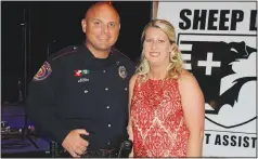  ?? (NWA Democrat-Gazette File Photo/Carin Schoppmeye­r) ?? Texarkana Police Department Cpl. Les and Allison Munn attend the Sheep Dog charity ball. Cpl. Munn was recognized by the group as this year’s Law Enforcemen­t Sheep Dog of the Year.