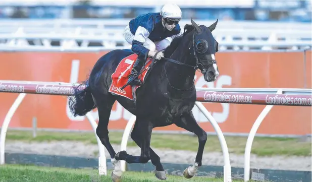  ?? Picture: AAP/JULIAN SMITH ?? FAVOURITE: Jockey James McDonald rides Yucatan to a win at Caulfield earlier this month. The overseas-based horse is favourite for the Melbourne Cup.