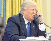  ?? AP PHOTO ?? In this photo taken Jan. 28, 2017, President Donald Trump speaks on the phone with Australian Prime Minister Malcolm Turnbull in the Oval Office of the White House in Washington. Transcript­s of President Donald Trump’s conversati­ons with the leaders of...