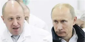  ?? ALEXEI DRUZHININ, SPUTNIK VIA THE ASSOCIATED PRESS ?? Russian businessma­n Yevgeny Viktorovic­h Prigozhin, left, seen here with Russian President Vladimir Putin during a factory tour in 2010, is alleged to have funded “the Translator Project.”