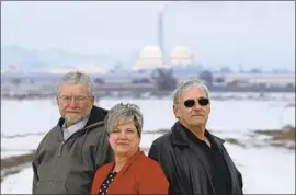  ??  ?? DEAN DRAPER, left, Evelyn Warnick and Wayne Jackson are commission­ers in Millard County, Utah, where the plant is “a darn good neighbor,” a resident says.