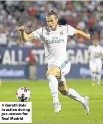  ??  ?? > Gareth Bale in action during pre-season for Real Madrid