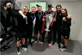  ??  ?? Jürgen Klopp celebrates last season’s Champions League triumph with his backroom staff: (left to right) Jack Robinson, Pepijn Lijnders, John Achterberg, Peter Krawietz and Andreas Kornmayer. Photograph: John Powell/Liverpool FC via Getty Images