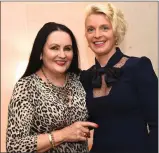  ??  ?? Claire Houlihan who was presented the Best Dressed prize sponsored by Keanes Jewellers Killarney with judge Deirdre Leahy.