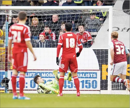  ??  ?? FAST START: Burnley’s Scott Arfield scores their first goal