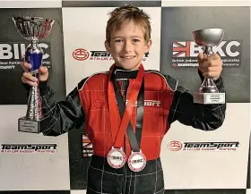  ?? ?? Ben with his trophies at the British indoor karting championsh­ip