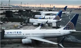  ?? Jersey. Photograph: Spencer Platt/Getty Images ?? United Airlines planes sit on the runway at Newark Liberty internatio­nal airport in New