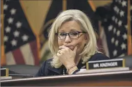  ?? ?? COMMITTEE Vice Chair Liz Cheney listens to Thursday’s harrowing testimony and the praise for Pence’s resistance to President Trump’s plot to stay in power.