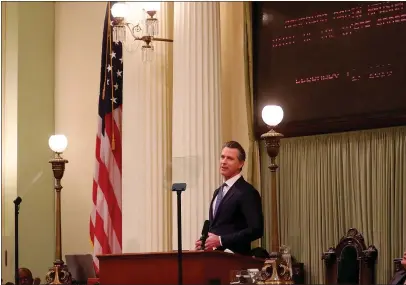  ?? ARIC CRABB — STAFF PHOTOGRAPH­ER ?? Newsom delivers the State of the State address Tuesday in the Assembly chamber of the state capitol in Sacramento.