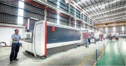  ??  ?? The software-driven CNC precision cutting laser for the creation of custom sheet metal