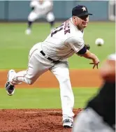  ?? Brett Coomer / Staff photograph­er ?? Brad Peacock went the first five innings before turning it over to four relievers to complete the six-hit shutout.