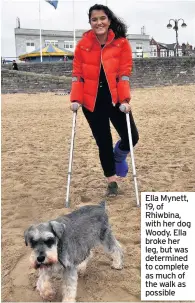  ??  ?? Ella Mynett, 19, of Rhiwbina, with her dog Woody. Ella broke her leg, but was determined to complete as much of the walk as possible