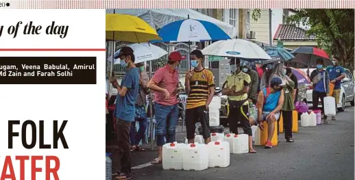  ?? PIC BY AZIAH AZMEE ?? People queuing to collect water at a local service centre set up by Pengurusan Air Selangor Sdn Bhd in Shah Alam yesterday.