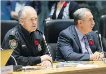  ?? WAYNE CUDDINGTON ?? Ottawa Police Chief Charles Bordeleau, left, answers only to the police board, chaired by Councillor Eli El-Chantiry, right.