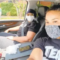  ?? COURTESY OF DAWN STALEY VIA AP ?? Dawn Staley, right, and her sister, Tracey Underwood, head home after Underwood’s first treatment at the Prisma Health Richland Hospital in South Carolina. Staley reached out to her colleagues to determine the best treatment options.