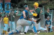  ?? GENE WALSH — DIGITAL FIRST MEDIA ?? Nor-Gwyn’s Jon McGlone scores as Lansdale’s Jim Smith fields the throw.