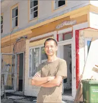  ?? JIM DAY/THE GUARDIAN ?? Bill Zhang of Future Space Decoration Inc. says renovation­s should be complete in three to four months on this building at the corner of Prince Street and Grafton streets in Charlottet­own that was severely damaged by fire in May 2015.