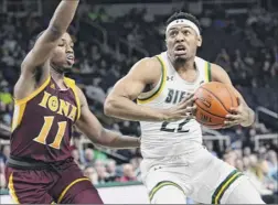  ?? Lori Van Buren / Times Union ?? Jalen Pickett, right, and Siena will play host to Iona on Jan. 19. The Gaels are now led by former Louisville coach Rick Pitino.