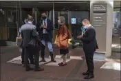  ?? MICHAEL LIEDTKE — THE ASSOCIATED PRESS FILE ?? Former Theranos executive Ramesh “Sunny” Balwani, right, stands near his legal team outside Robert F. Peckham U.S. Courthouse in San Jose.