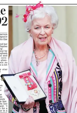  ??  ?? Honour: June Whitfield with her medal yesterday