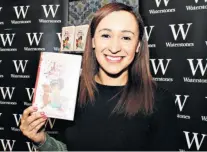  ??  ?? Off track: Dame Jessica Ennis-hill with one of her books