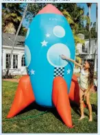  ??  ?? The Funboy Backyard Rocketship Sprinkler is more than 71⁄2 feet tall.