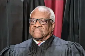  ?? J. Scott Applewhite / Associated Press ?? Associate Justice Clarence Thomas was in his mid-40s and in his third year on the nation’s highest court when he paid off the last of his debt from his time at Yale Law School.