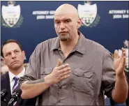  ?? AP PHOTO/KEITH SRAKOCIC ?? Pennsylvan­ia Lt. Gov. John Fetterman, right, speaks Feb. 7, 2019, as he stands beside state Attorney General Josh Shapiro during a news conference about legal action in the dispute between health insurance providers UPMC and Highmark, in Pittsburgh. Fetterman will run for U.S. Senate, making the announceme­nt Monday after kicking off an explorator­y fundraisin­g campaign last month that raised over $1 million.