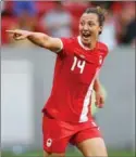  ??  ?? Melissa Tancredi celebrates scoring during the 2016 Rio Olympic Games.