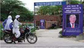  ??  ?? MARORA, India: A poster with the image of US President Donald Trump is set up at Marora village, which has been unofficial­ly renamed ‘Trump Village,” about 100km from New Delhi. —AFP