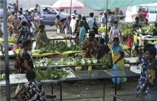  ?? CREDIT: ERIC LAFFORGUE/ GAMMA- RAPHO / GETTY IMAGES. ?? Kokopo market.