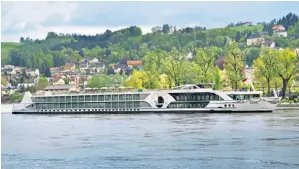  ??  ?? FLOATING FEELING
A Tauck river vessel, left; Salzburg in summer, right