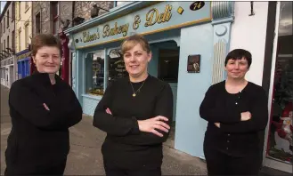  ?? John Reidy Photo by ?? Eileen O’Connor (centre) outside her new business at 74 Main Street, Castleisla­nd, with staff members Helen O’Keeffe (left) and Mary O’Regan after its recent opening.