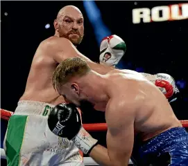  ?? AP ?? British Boxer Tyson Fury on the attack against his Swedish opponent Otto Wallin during their heavyweigh­t fight in Las Vegas on Saturday (NZ time).