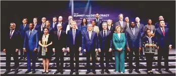 ?? — AFP ?? Summit leaders pose for a family photo during the Third Summit for Democracy in Seoul.