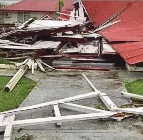  ?? AFP PIC ?? A building at Tonga’s Parliament House that was damaged by Cyclone Gita.