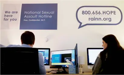  ?? Reuters ?? Volunteers on the national sexual assault hotline work both over the phone and via web chat at the offices of the Rape Abuse Incest National Network in Washington. —