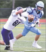  ?? Pete Paguaga / Hearst Connecticu­t Media ?? Ansonia’s Garrett Cafaro sacks Oxford quarterbac­k Cayden Mitchell on Thursday.