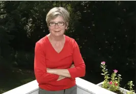  ?? ANDREW SHURTLEFF — THE ASSOCIATED PRESS FILE ?? Author Barbara Ehrenreich poses at her home in Charlottes­ville, Va., on Aug. 25, 2005.