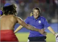  ?? ARNULFO FRANCO — THE ASSOCIATED PRESS FILE ?? In this file photo from Panama coach Hernan Dario Gomez celebrates with Roman Torres, who scored his team’s second goal, after a World Cup qualifying soccer match against Costa Rica in Panama City.