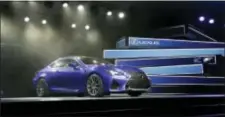  ?? CARLOS OSORIO — THE ASSOCIATED PRESS FILE ?? The Lexus RC F Coupe is unveiled at the at the North American Internatio­nal Auto Show in Detroit.