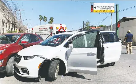  ?? Associated press ?? A rented minivan with North Carolina license plates and multiple bullet holes sits on a street in Matamoros, Mexico. Four Americans were traveling in the vehicle when gunmen shot at them and abducted them Friday; the victims were found on the outskirts of the city Tuesday.