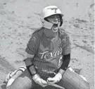  ?? KAILA JONES/TREASURE COAST NEWSPAPERS ?? Texas' Bella Dayton celebrates after reaching base safely against Oklahoma in the Longhorns' 2-1 win Sunday that clinched the series.