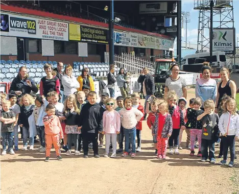  ??  ?? YOUNGSTERS at Dens Road Nursery have been busy taking part in a sponsored walk.
The kids, aged between three and five, along with their parents/carers and nursery staff are raising funds for their annual trip.
For the first time the children will be...