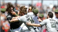  ?? ARIC CRABB/TRIBUNE NEWS SERVICE ?? Washington Nationals' Bryce Harper (34) fights with the Giants' Michael Morse, center, and Jeff Samardzija, left, on Monday in San Francisco.