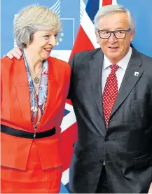  ?? Pictures: PETER NICHOLLS / REUTERS, PA ?? Theresa May spoke to Jean-Claude Juncker last night