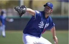  ?? GINA FERAZZI/TRIBUNE NEWS SERVICE FILE PHOTO ?? The Dodgers’ Clayton Kershaw is the majors’ highest-paid player again.